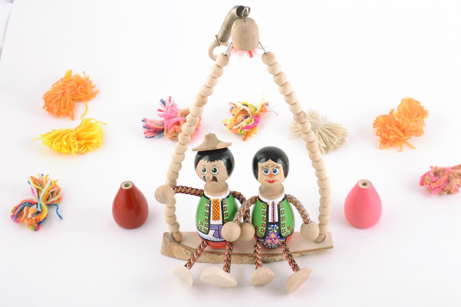 Children's handmade wooden toy with spring painted with eco dyes photo 1