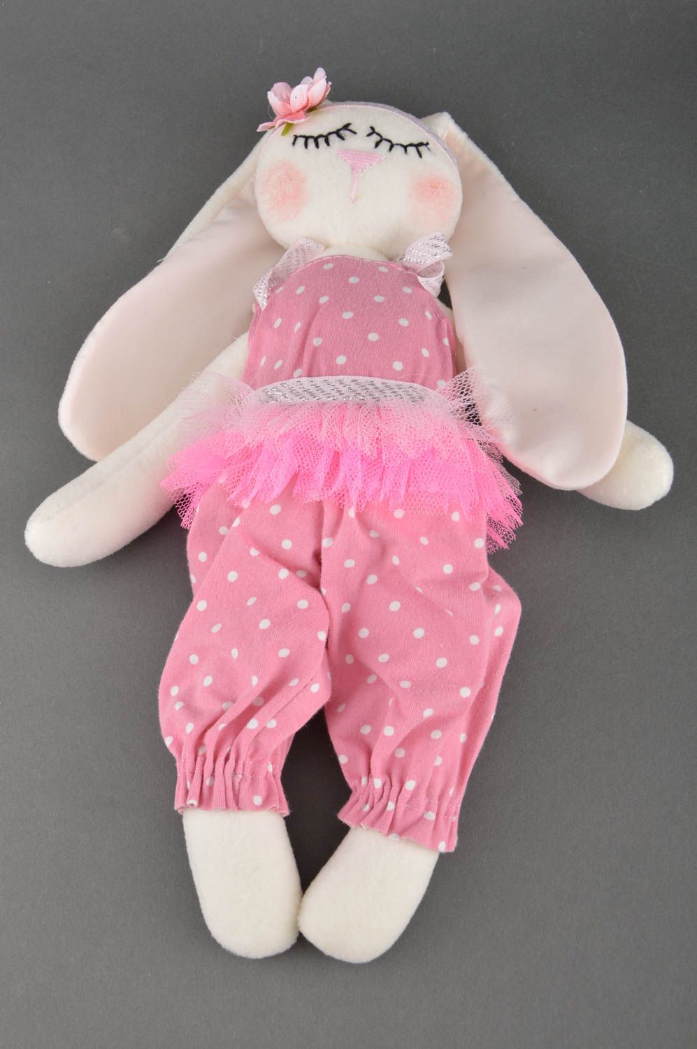Handmade soft toy sewn of cotton fabric rabbit in pink clothing for children photo 4