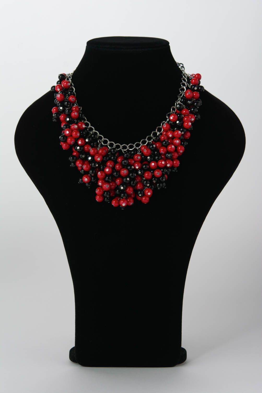 Handmade necklace made of ceramic beads on metal chain red and black stylish jewelry photo 2