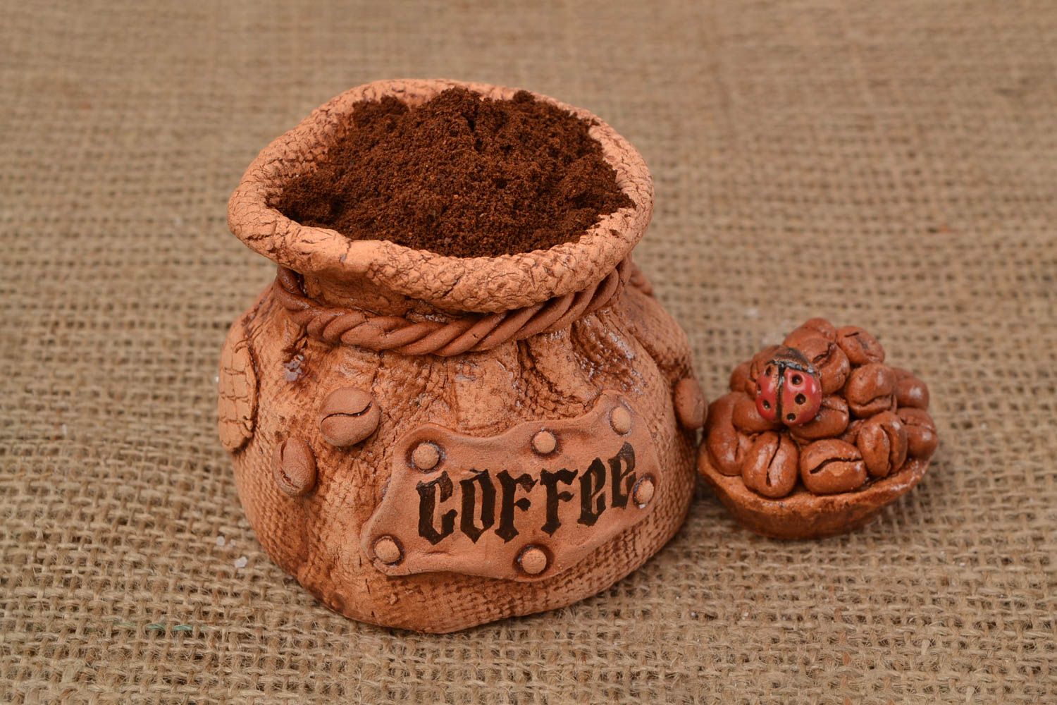 Unusual vessel for free-flowing ingredients in shape of sack for coffee photo 1
