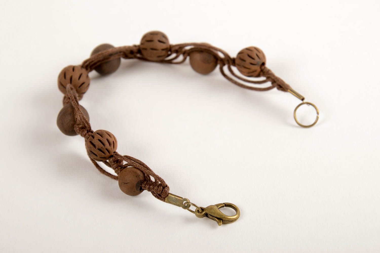 Браслет ручной работы браслет из керамики наручный браслет коричневый плетеный фото 2