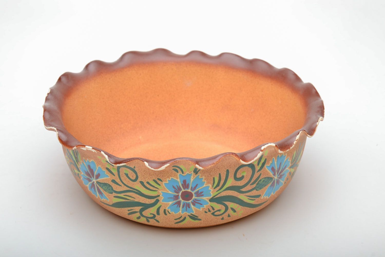Clay bowl painted with glaze photo 3