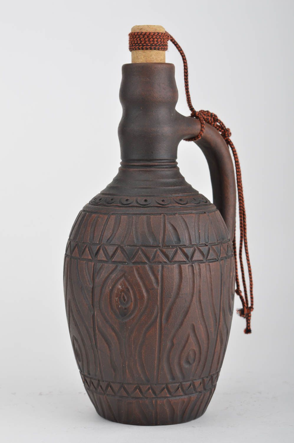 Bouteille en argile faite main décorative avec bouchon et anse brune à motif photo 2