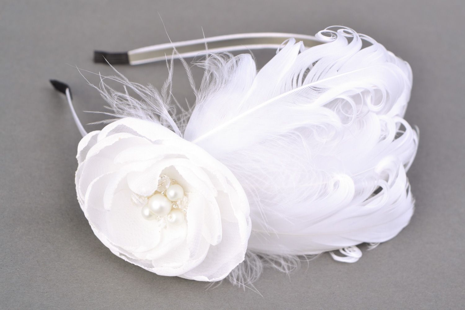 Handmade headband with white decorative fabric flower and natural feathers photo 1