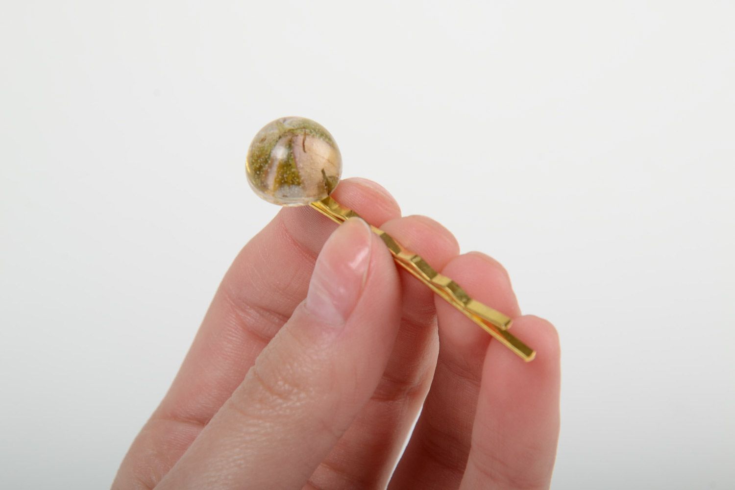 Handmade small hair clip with metal basis and natural plant in epoxy resin photo 5