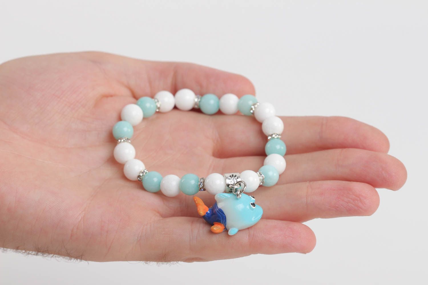 Turquoise and white beads elastic kids' bracelet with little wale charm  photo 5