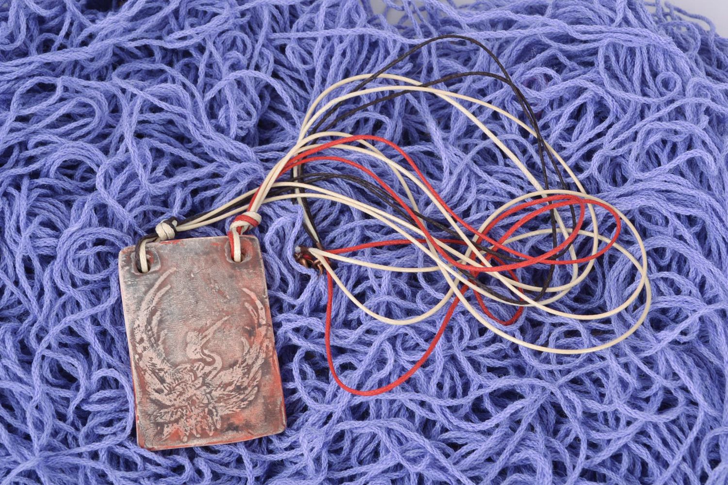 Rectangular ceramic pendant with colorful cords photo 1