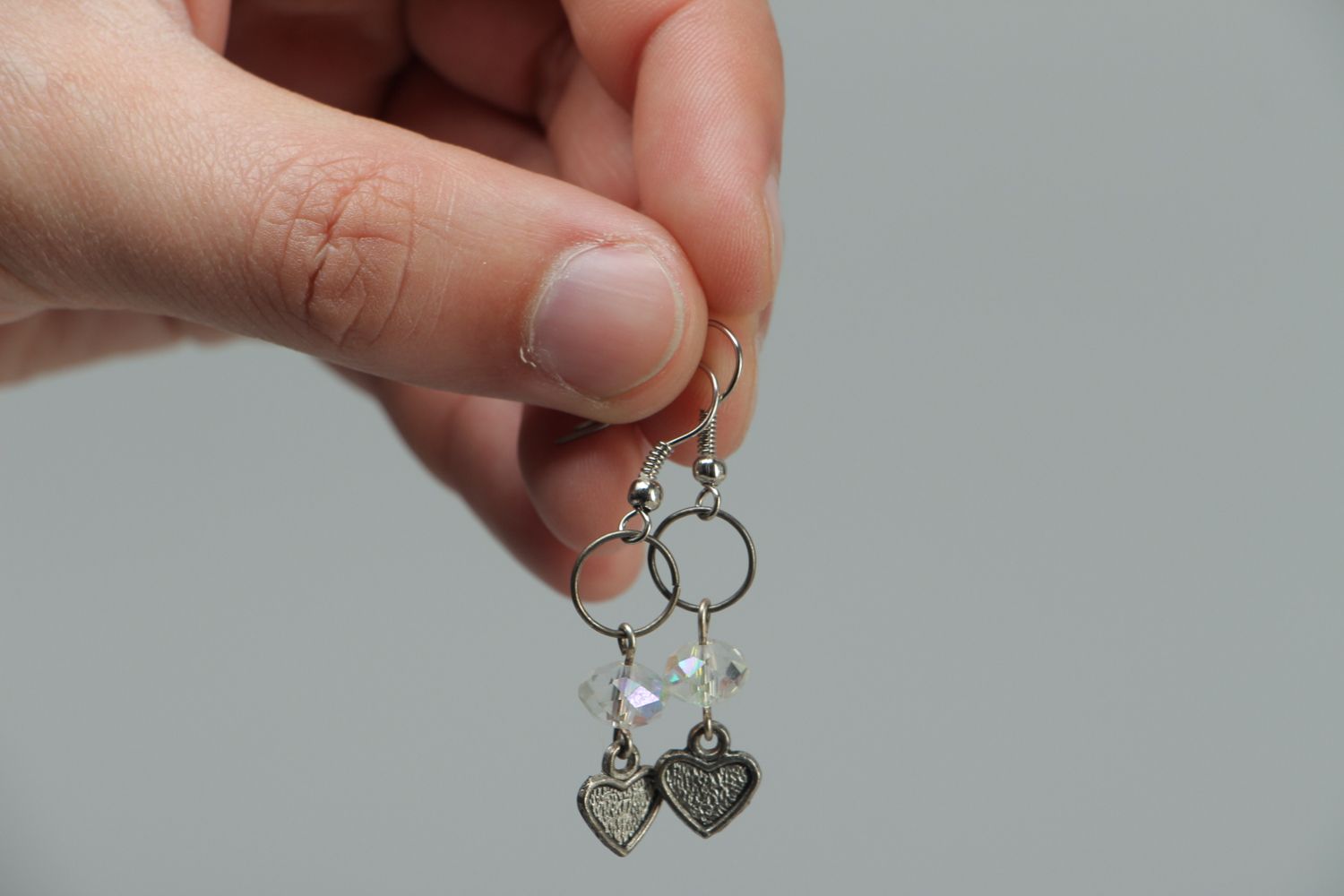 Metal earrings with heart beads photo 3