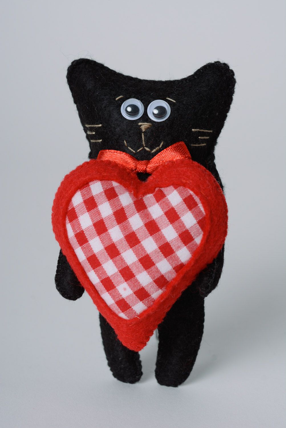 Handmade beautiful soft toy made of felt cute black cat with red heart  photo 1
