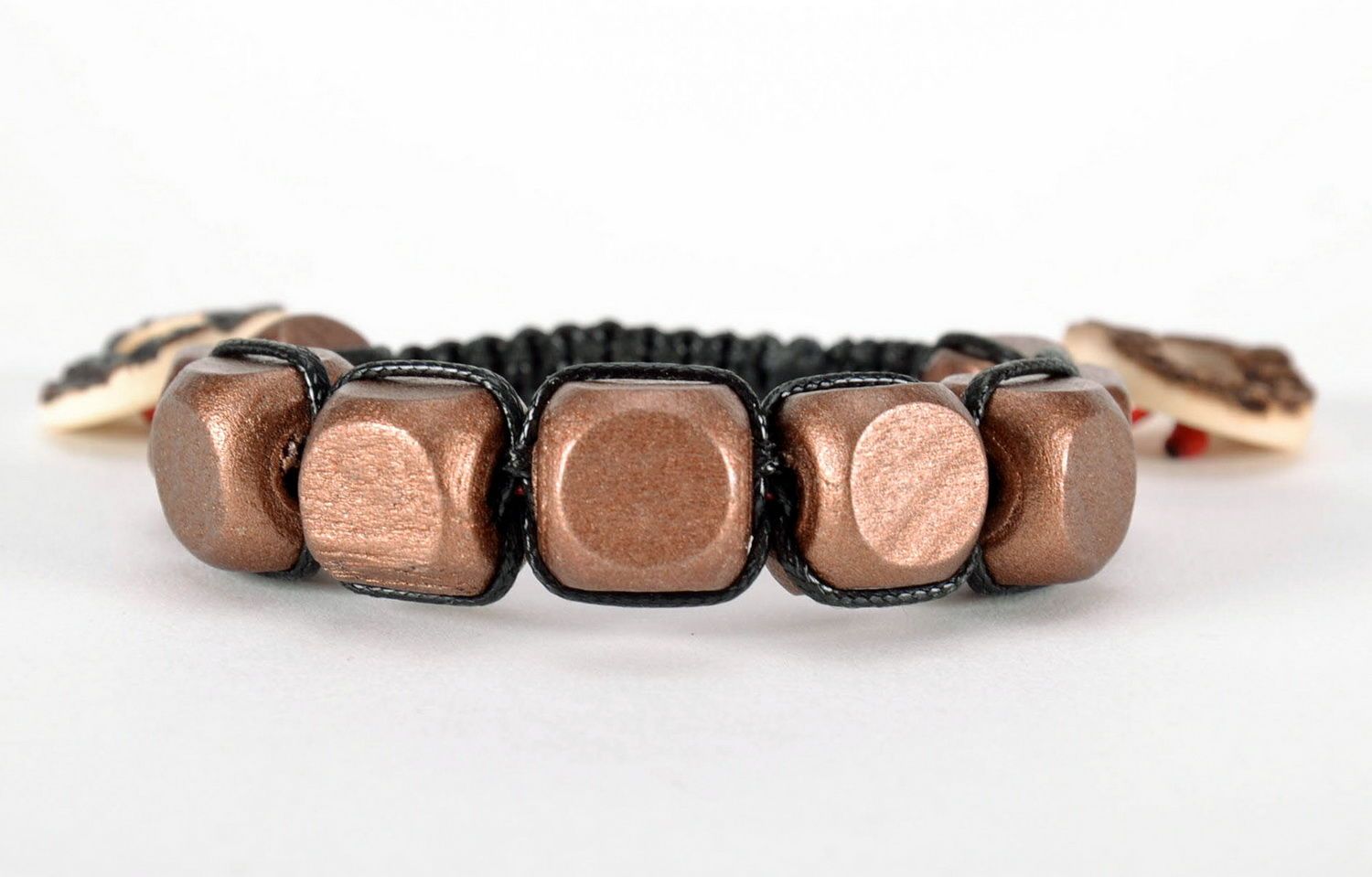 Bracelet made of wooden beads and plastic buttons photo 1