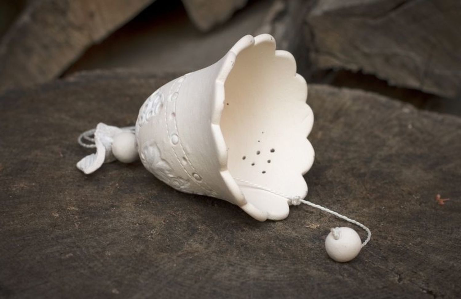 Ceramic bell made from white clay photo 2
