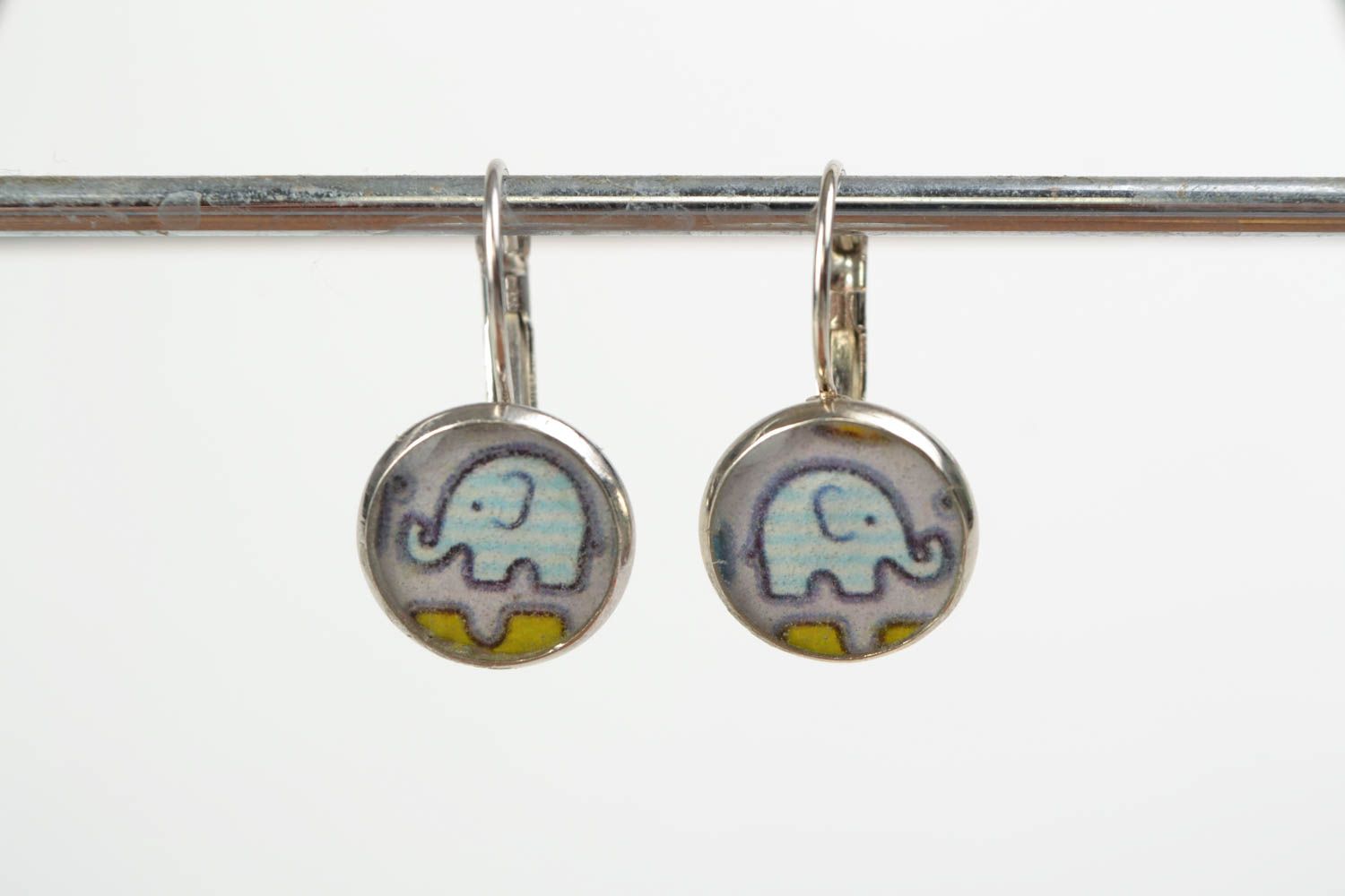 Handmade earrings with decoupage print coated with jewelry resin Elephants photo 2