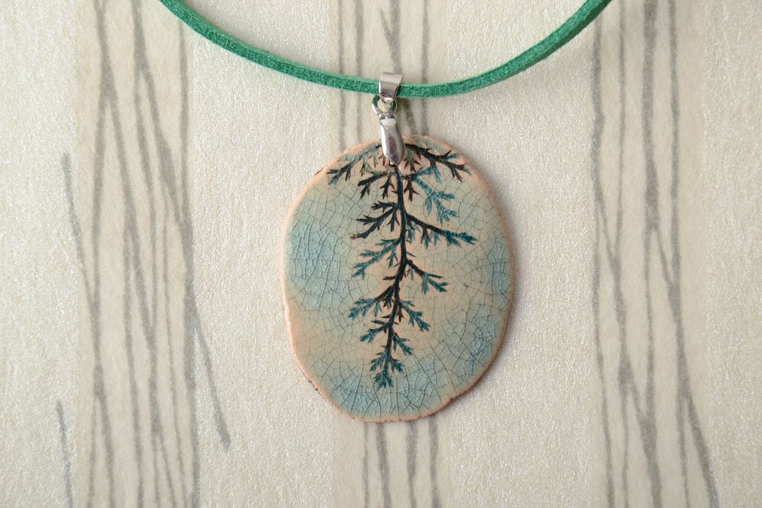 Enamel and glaze painted clay pendant with leather cord photo 1