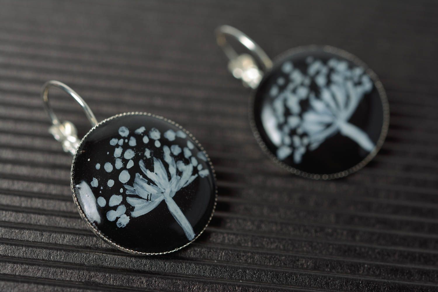 Round-shaped black handmade earrings made of epoxy resin with picture inside photo 5