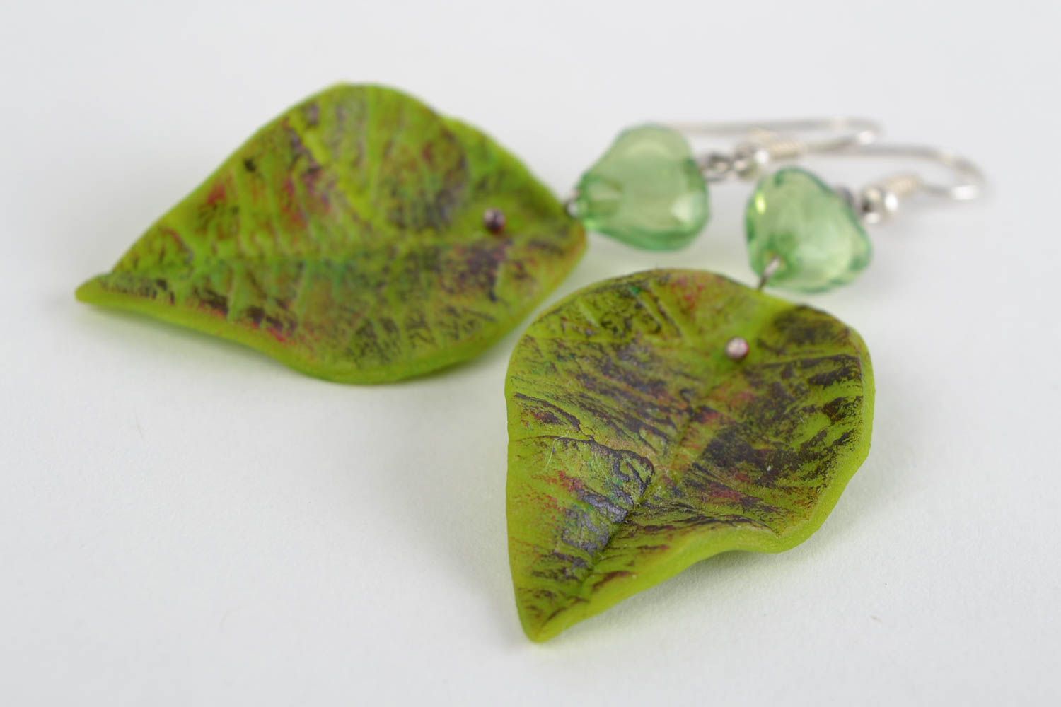 Large handmade green polymer clay earrings in the shape of leaves photo 4