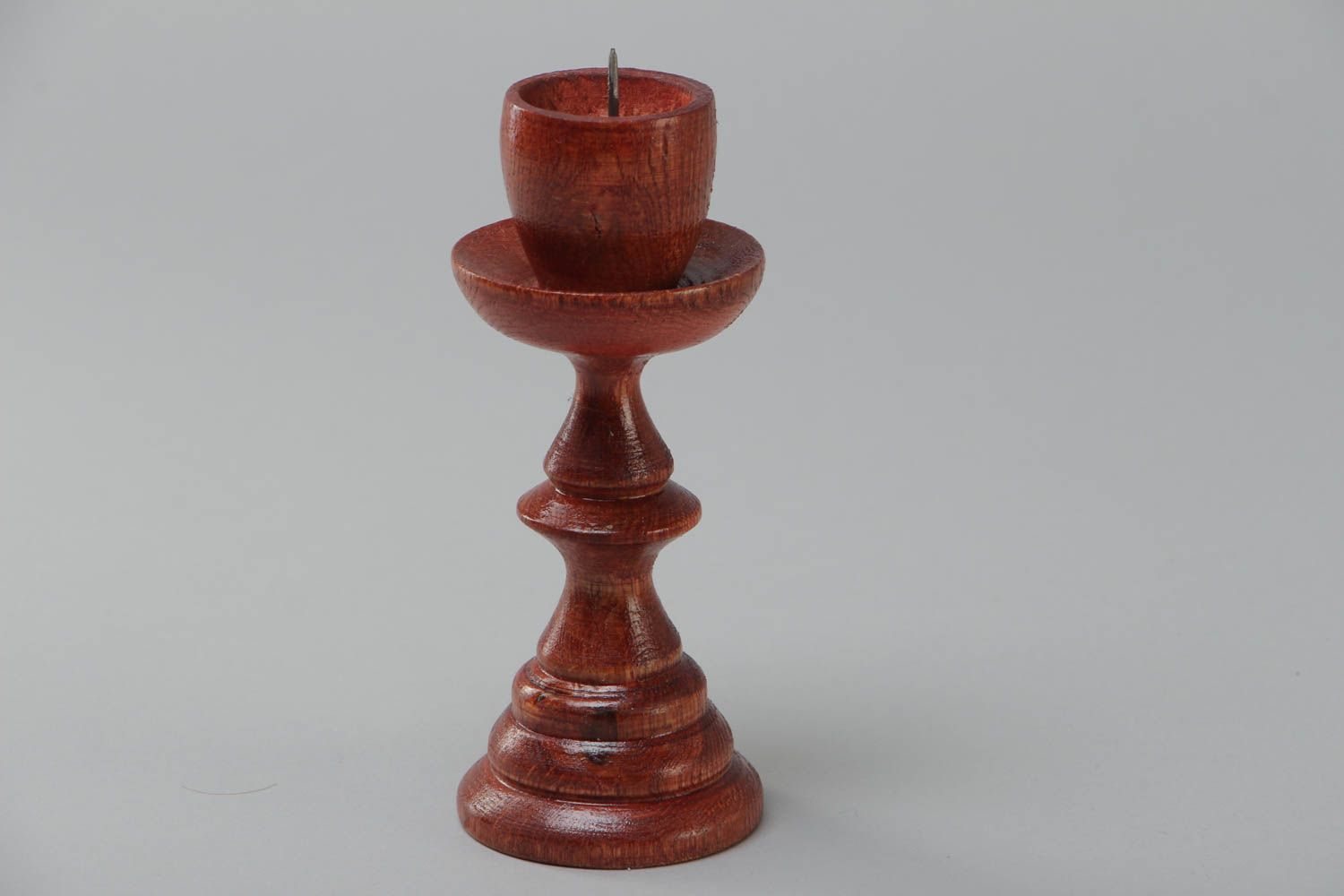 Wooden handmade brown candlestick for one candle covered with wood stain photo 2