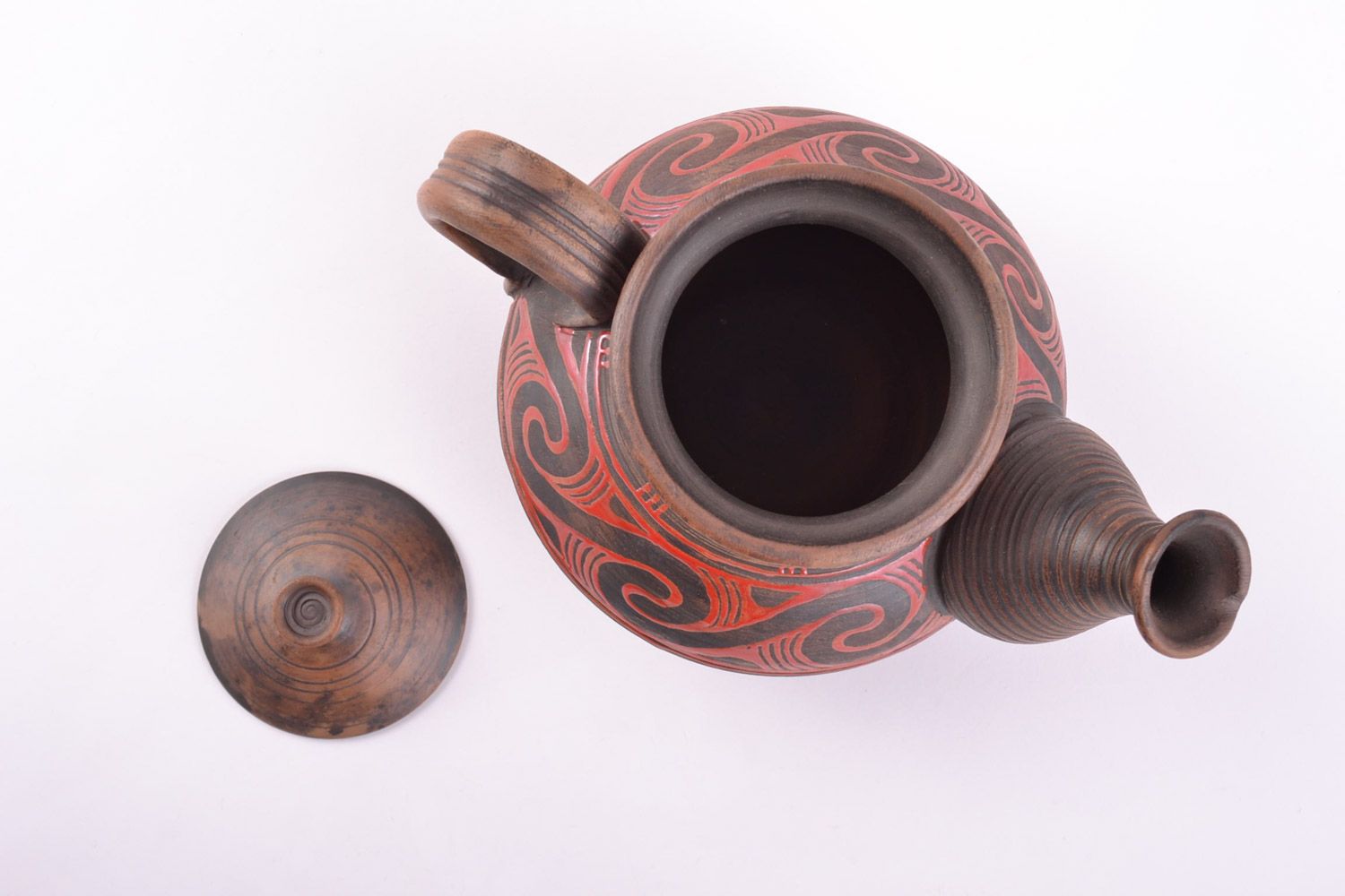 Handmade decorative ceramic teapot kilned with milk and painted with glaze photo 3