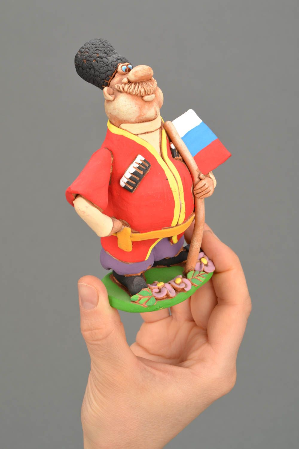 Ceramic figurine Cossack with Russian flag photo 2