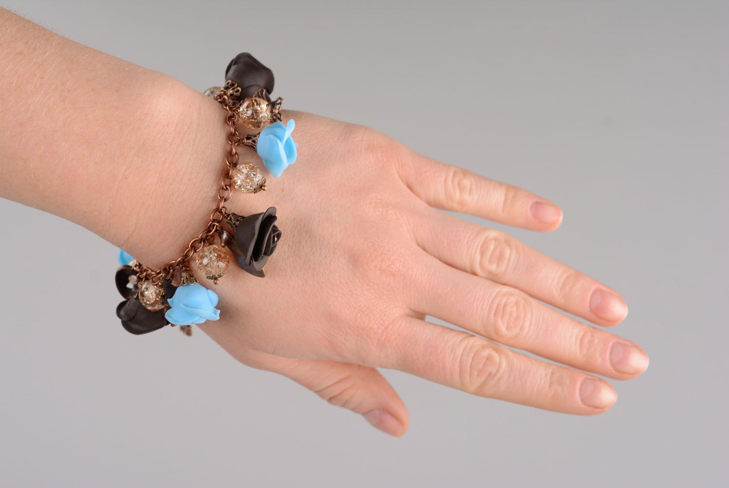 Charm brown and turquoise roses bracelet with transparent glass balls photo 1