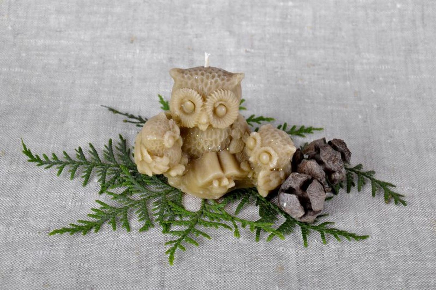 Candle made of natural wax Owl family photo 1