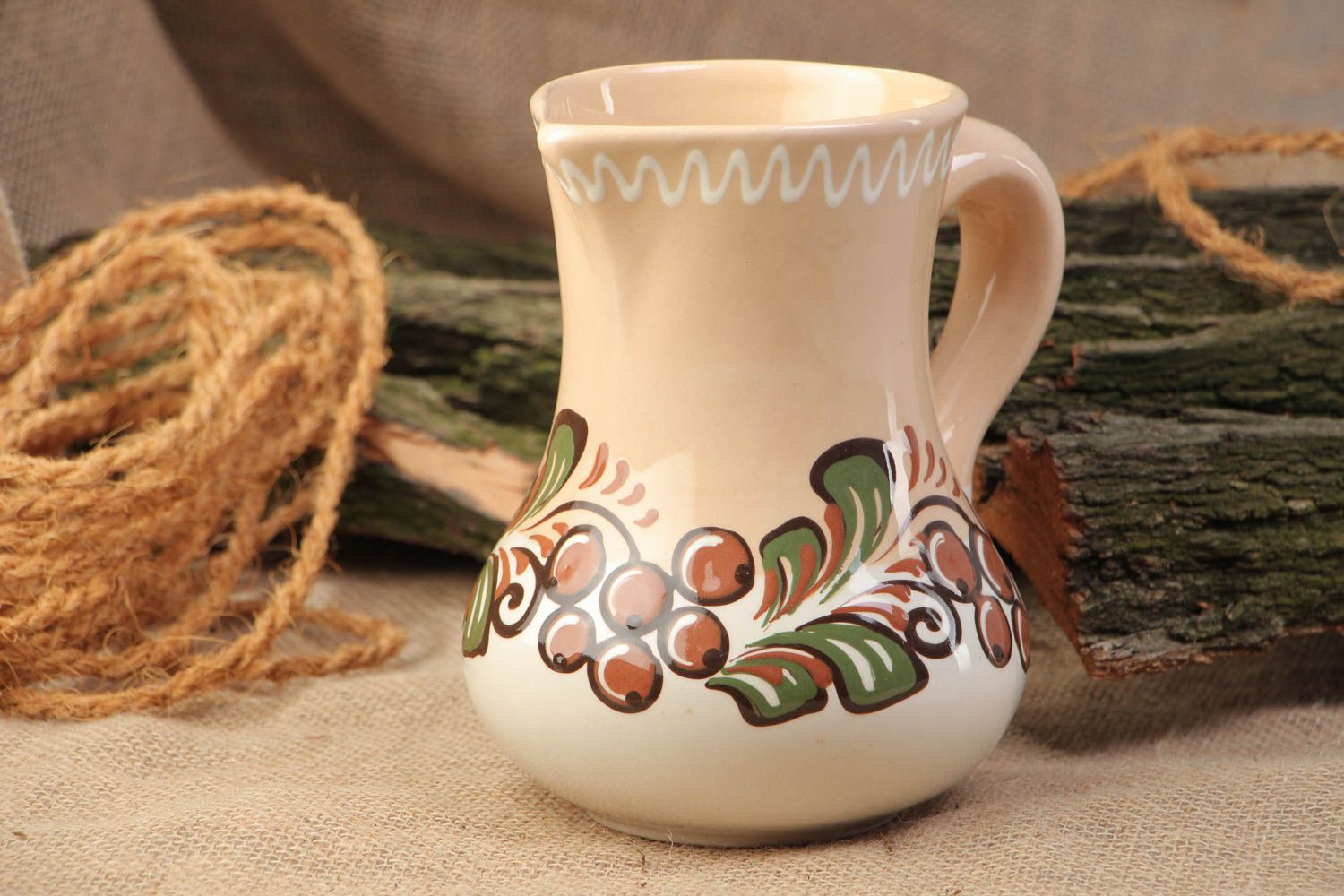 Cruche céramique faite main peinte de glaçure colorée originale à motif photo 1