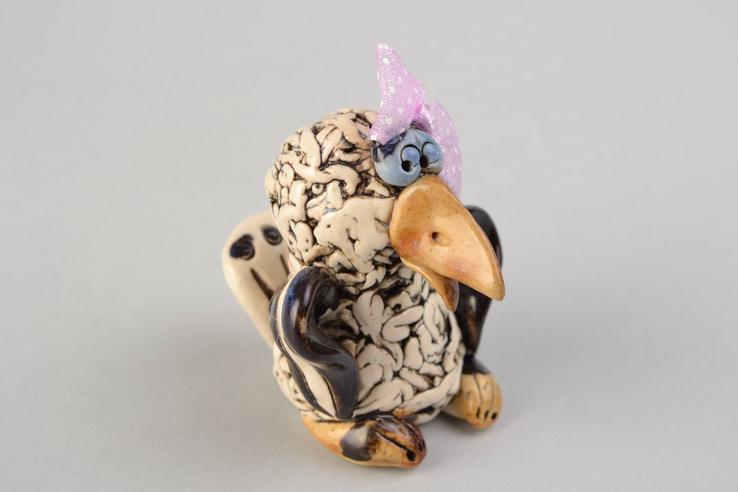 Handmade decorative beautiful ceramic figurine crow with bow painted manually photo 4