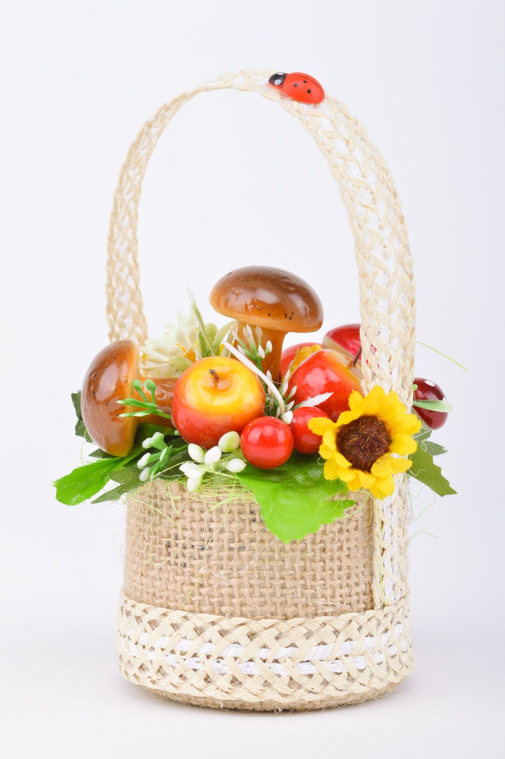 Small handmade decorative basket with mushrooms and fruit interior composition photo 2