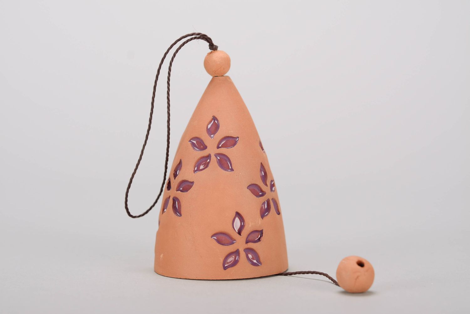 Bells made from red clay with embossment photo 2