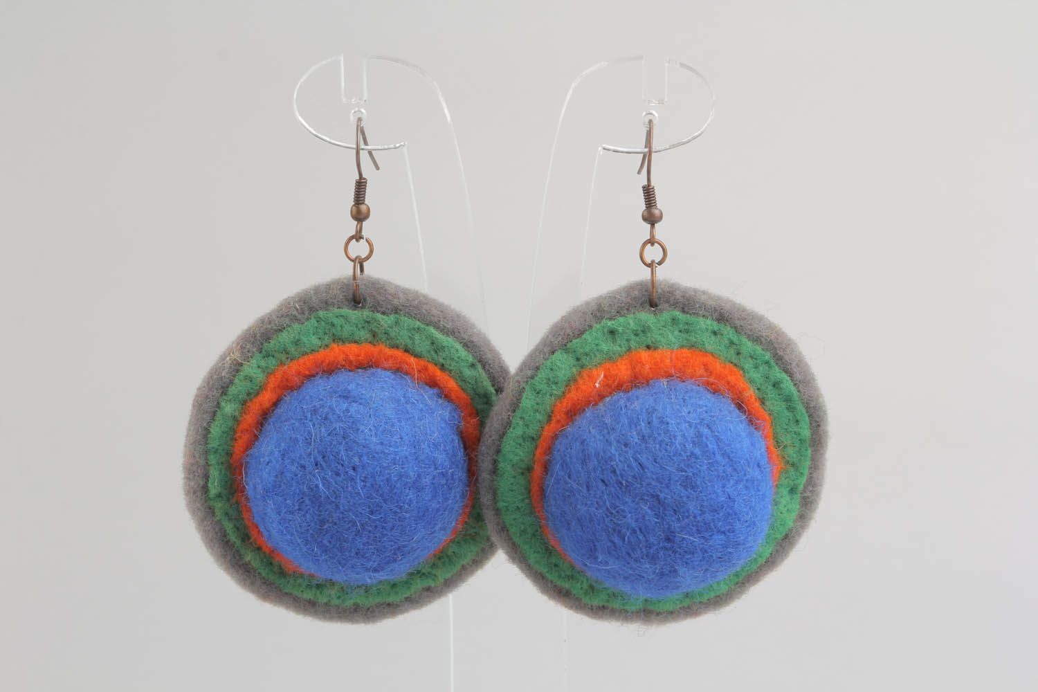 Round earrings made of wool and felt using felting technique photo 5