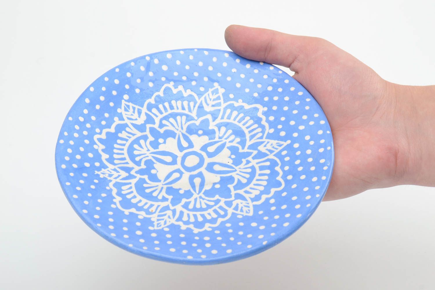 Handmade decorative small glazed ceramic saucer of blue color with white pattern photo 5