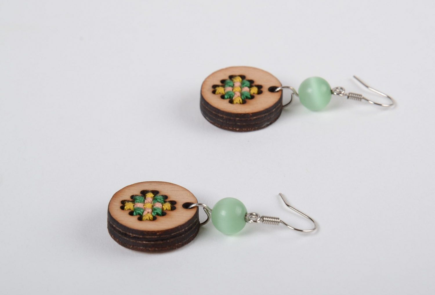 Handmade plywood earrings with cross stitch embroidery and beads in ethnic style photo 2