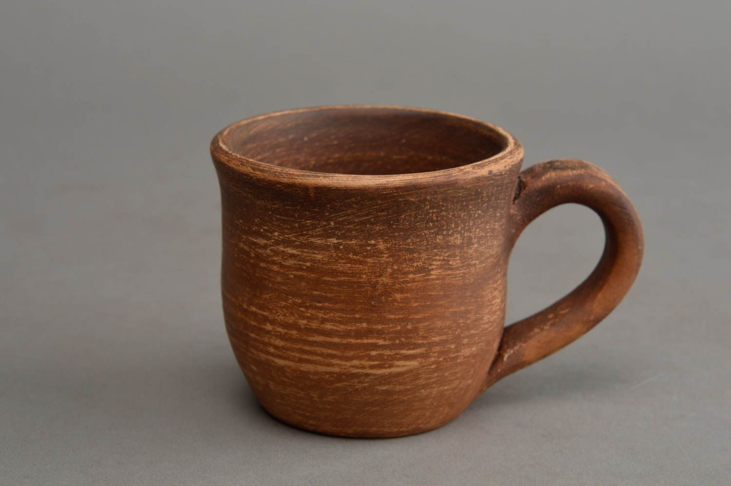 Old fashion rustic brown color clay cup with handle and no pattern photo 2