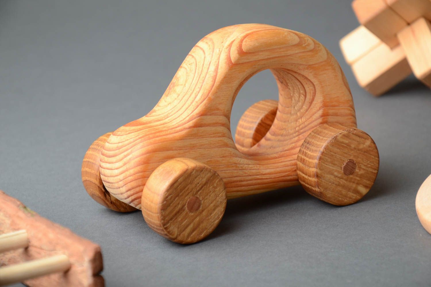 Handmade small eco friendly wooden wheeled toy coated with linen oil for kids photo 2