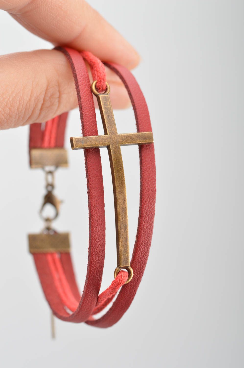 Handmade bracelet made of chamois leather laces with insert in shape of cross photo 3