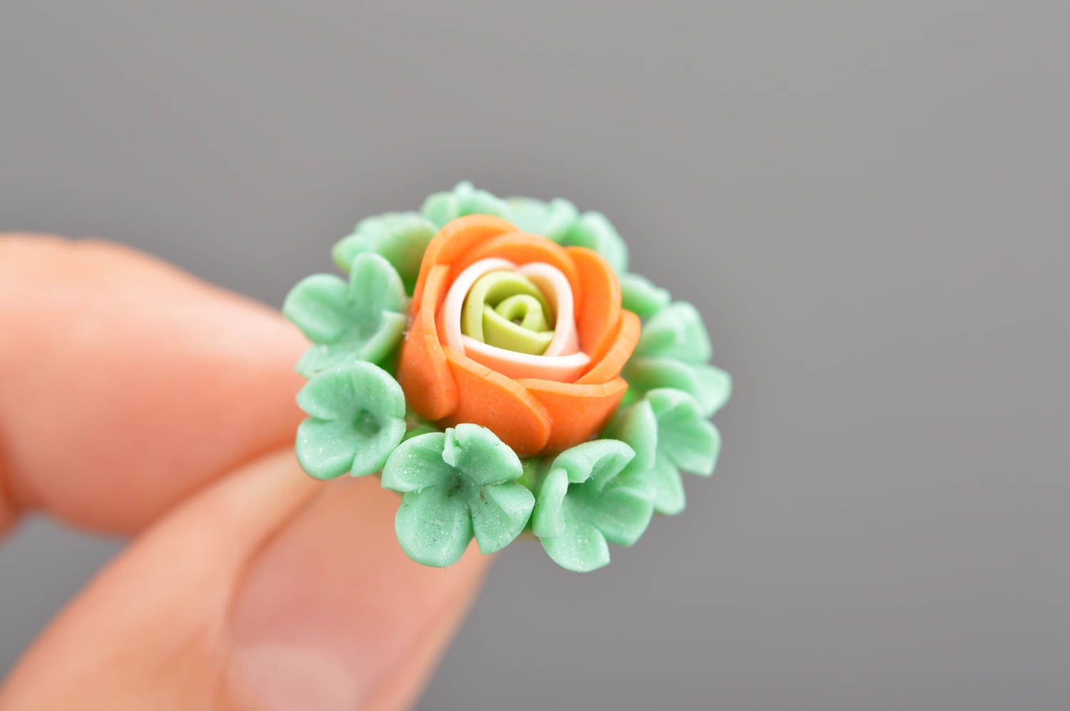 Handmade green and orange stud earrings made of polymer clay in shape of flowers photo 2