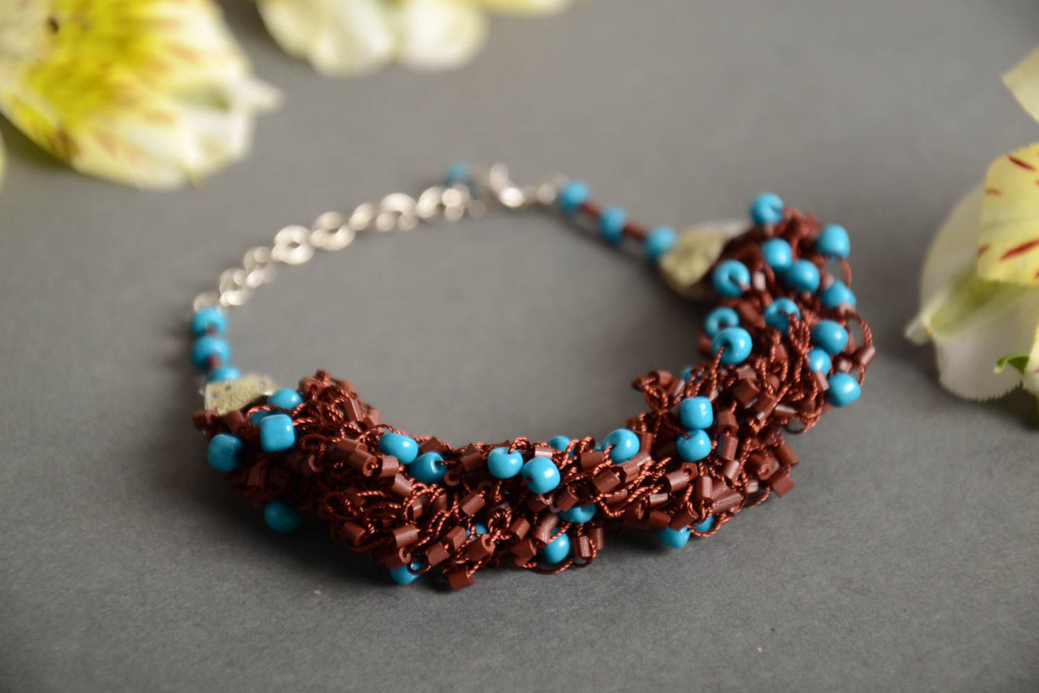 Handmade designer crocheted wrist bracelet with brown and blue Czech beads photo 1