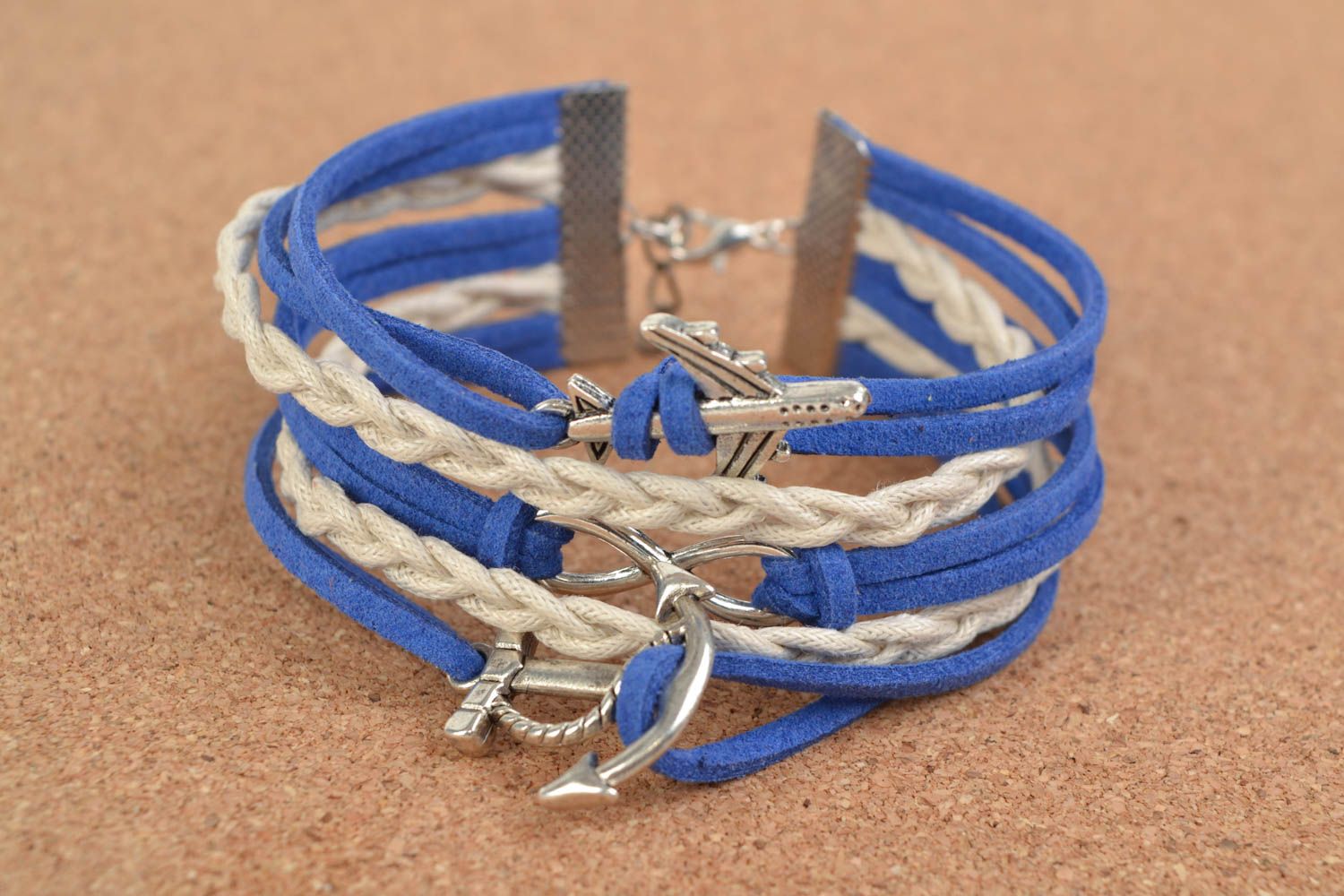 Blue and white stylish handmade wide woven suede bracelet with charms photo 1