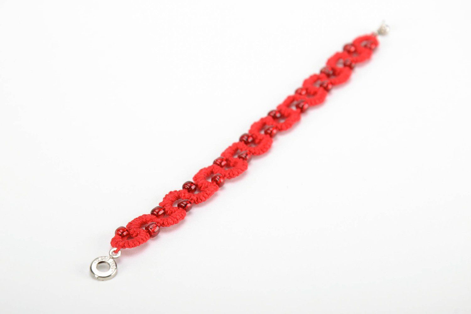 Red bracelet made from cotton threads photo 4