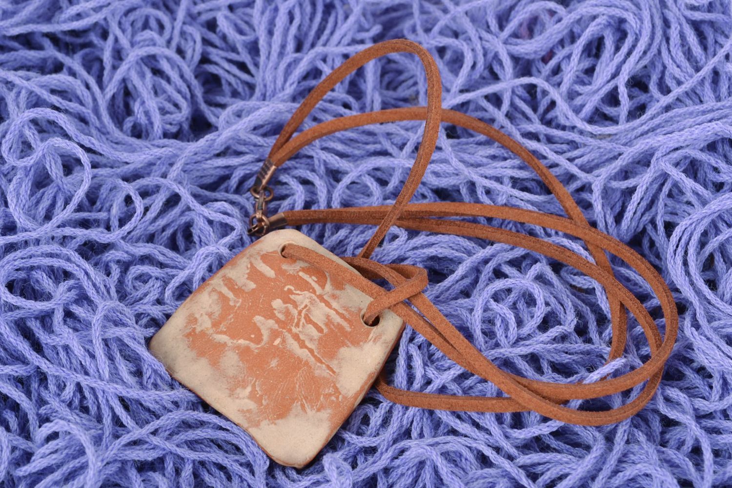 Ceramic pendant with cord photo 1