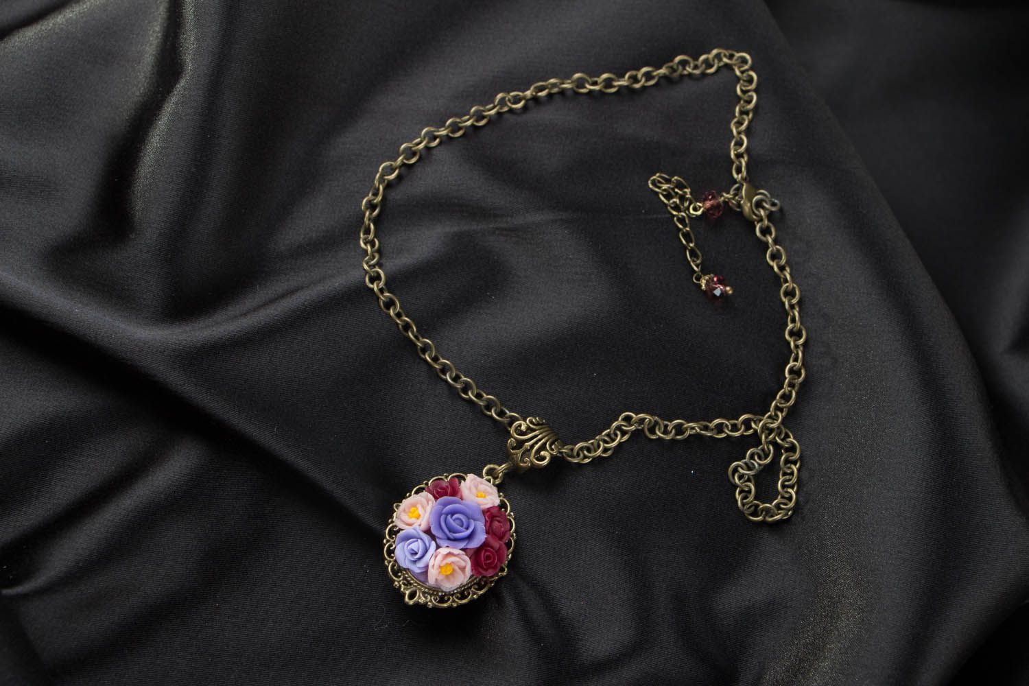 Pendant with a chain photo 1