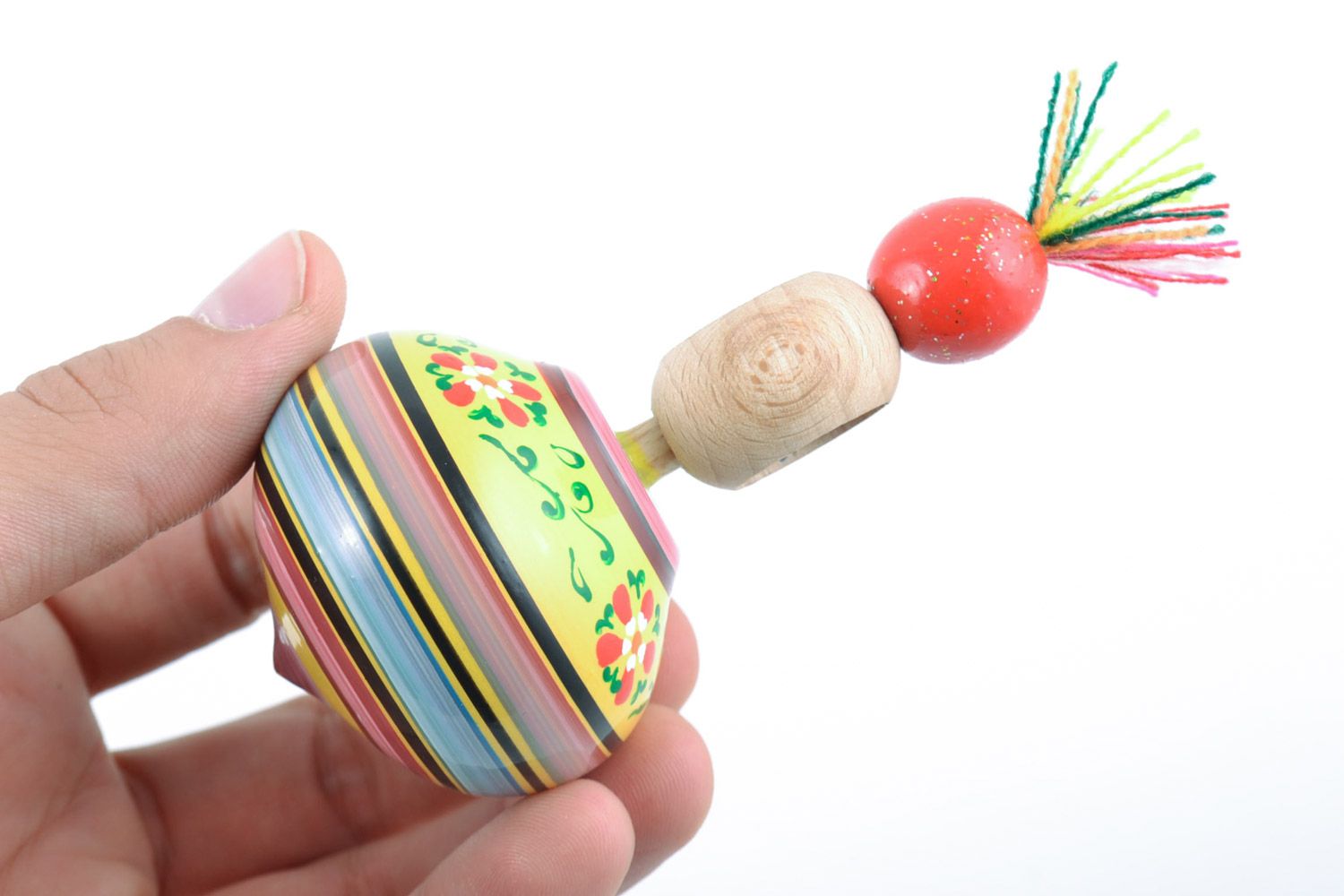 Homemade eco friendly wooden toy spinning top painted with ornaments for kids photo 2