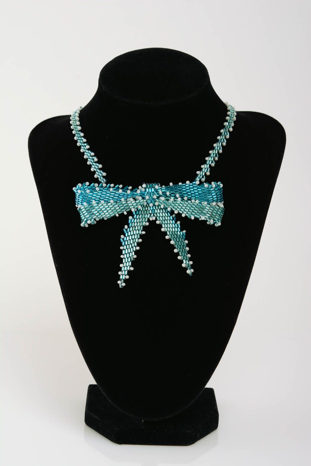 Unusual women's handmade blue beaded necklace with bow stylish jewelry photo 2