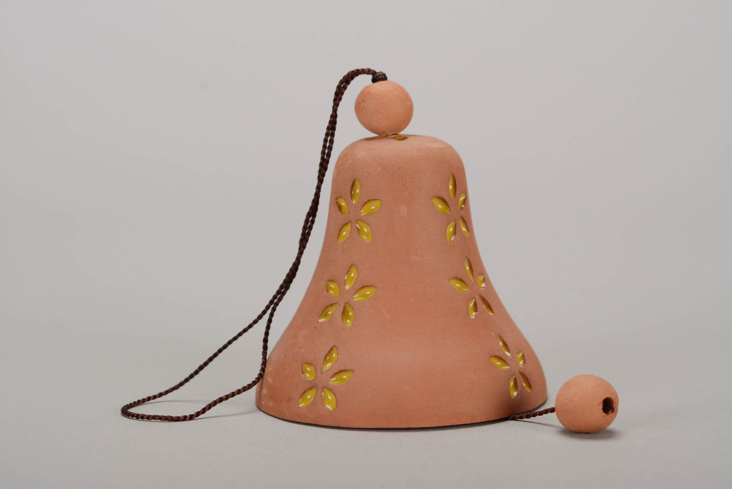 Bell made from red clay photo 3