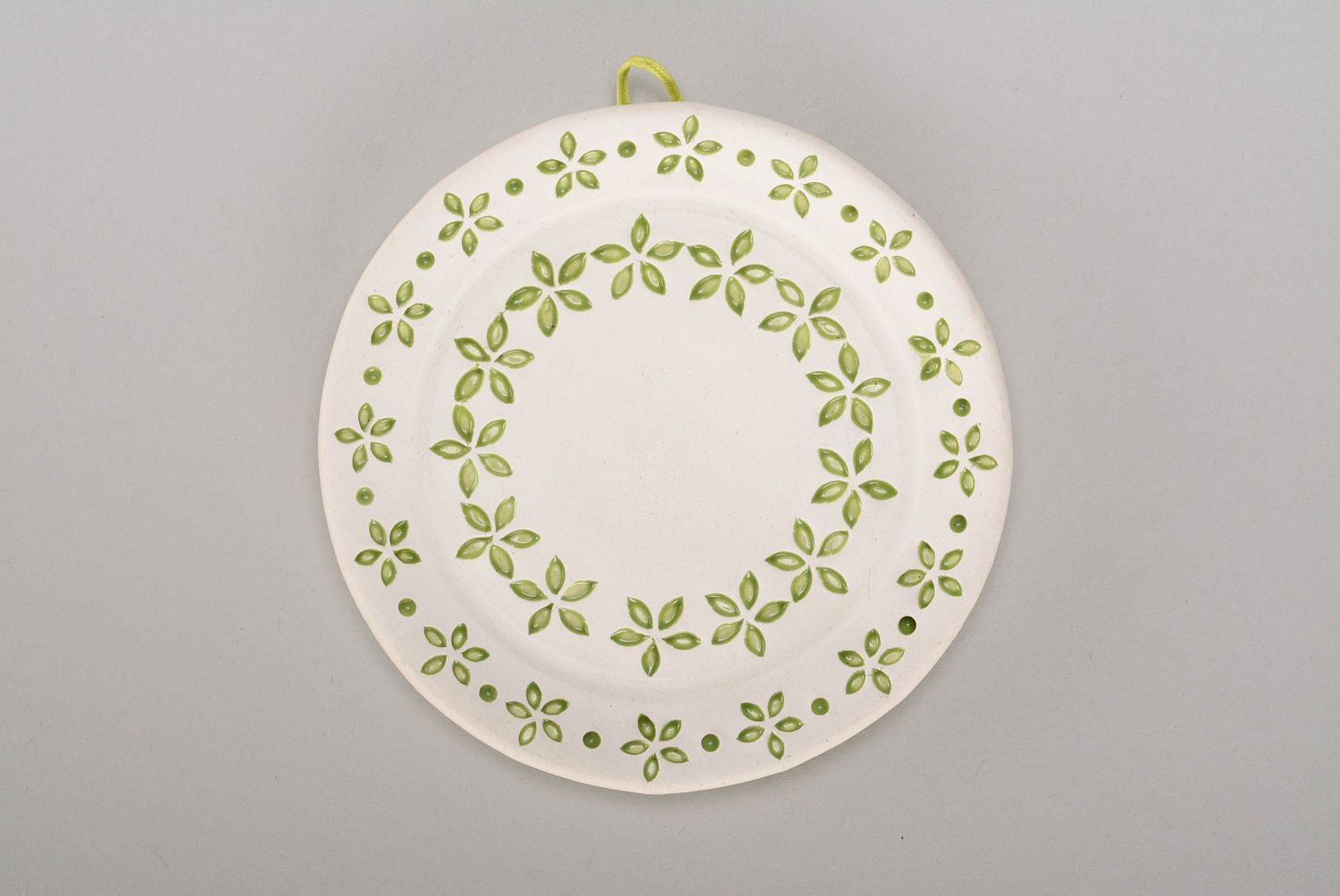 Decorative plate with bright green flowers photo 3