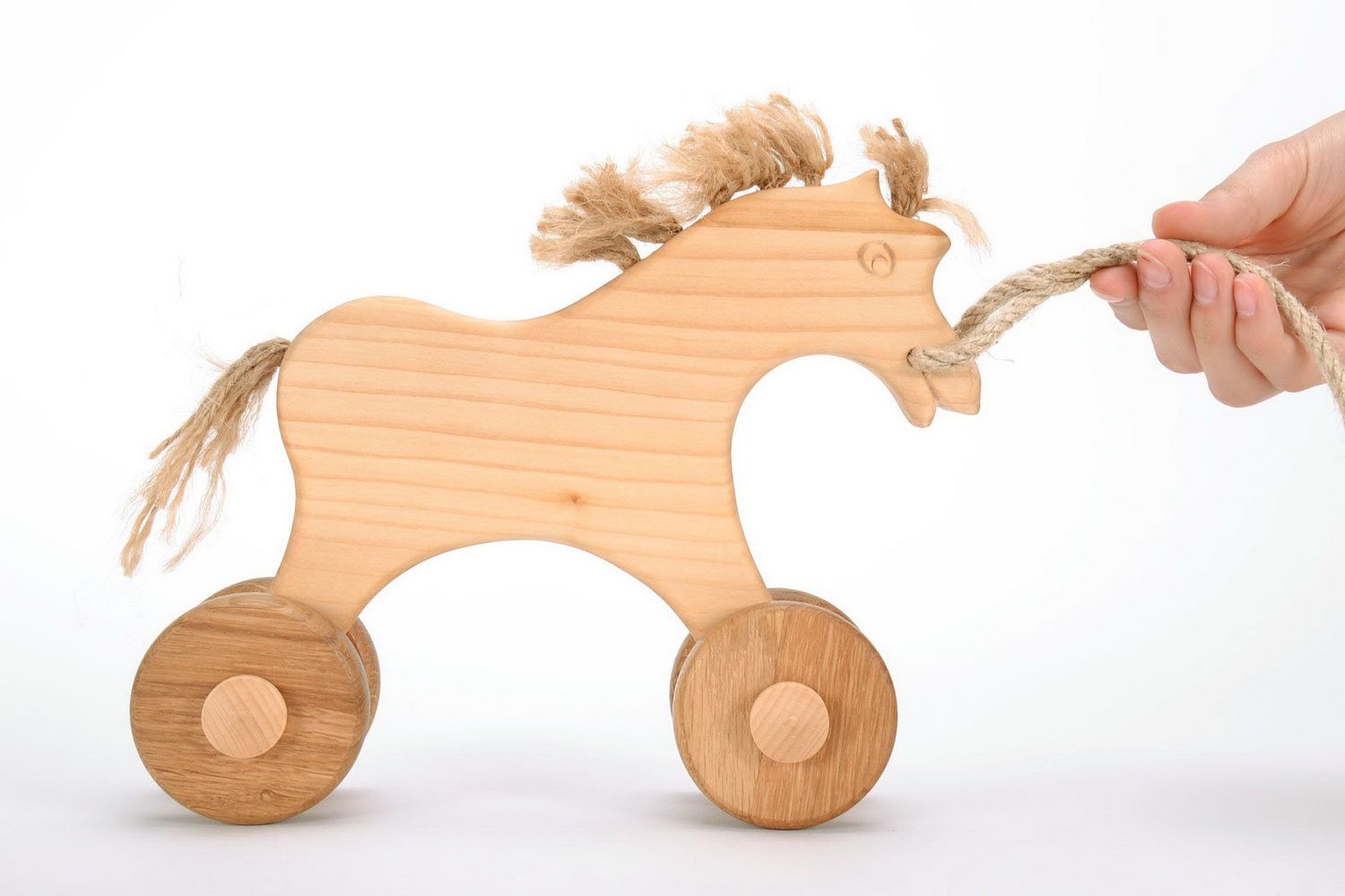 Wooden toy on wheels Horse photo 3