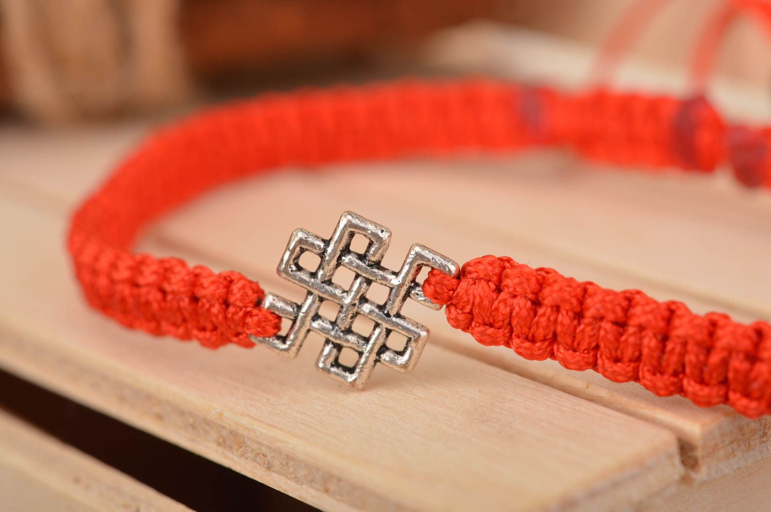 Handmade designer woven red silk friendship bracelet with metal insert photo 4