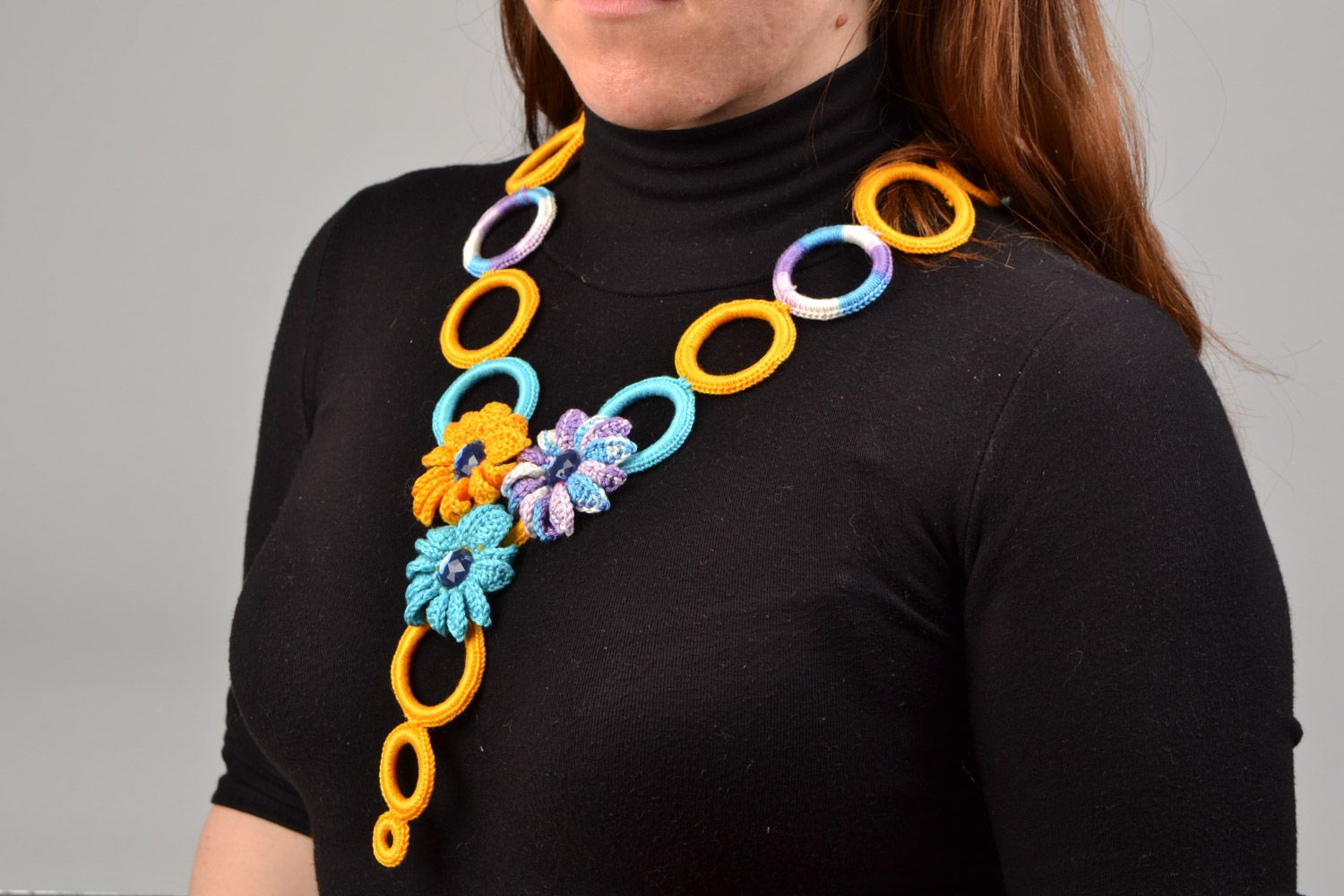 Bright handmade necklace woven of yellow and blue threads with rhinestones photo 1