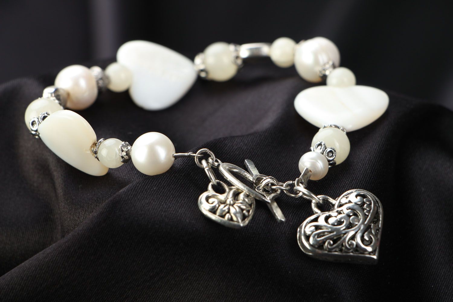 Nacre bracelet with charms photo 2
