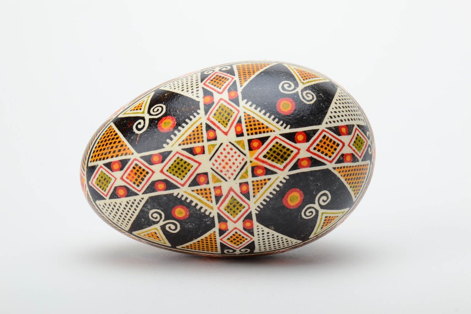 Handmade decorative dark painted goose egg with geometric ornament Easter souvenir photo 3