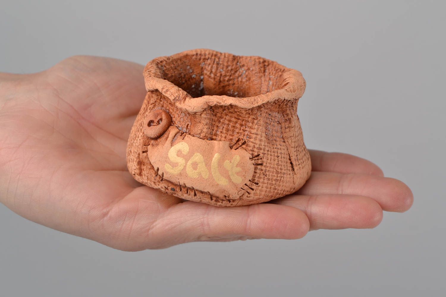 Handmade decorative small eco friendly ceramic salt cellar in the shape of bag photo 2